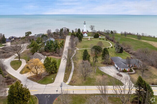 Wind Point features lakeside homes, a lighthouse, and Shoop Golf Course.