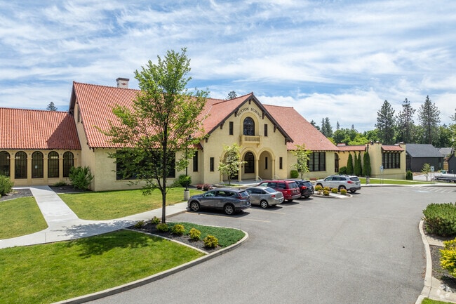 Hutton Elementary has a small staff parking lot in front of the school.