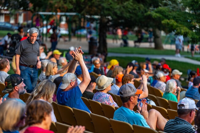 Residents and visitors come to Baker Park to enjoy live music during the Frederick Summer Concert Series.