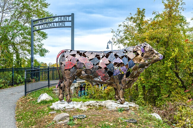 The Iron cow statue is a tribute to workers & entrepreneurs of the JacPac meat processing plant.