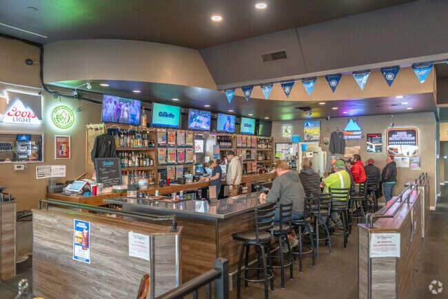 Meet some friends for a drink after work at Centennial Bar and Grill near Bryant.