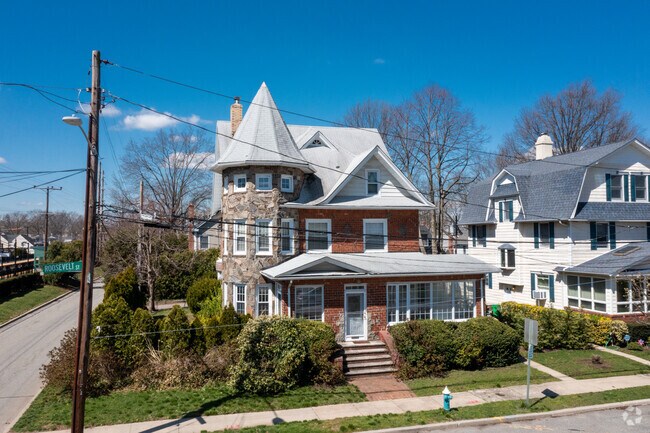 The traditional brick homes in Stewart Manor are on beautiful tree-lined neighborhood streets.