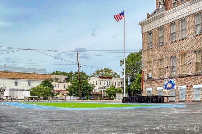 Students at PS 66 can have fun on their playground track during recess or after school.