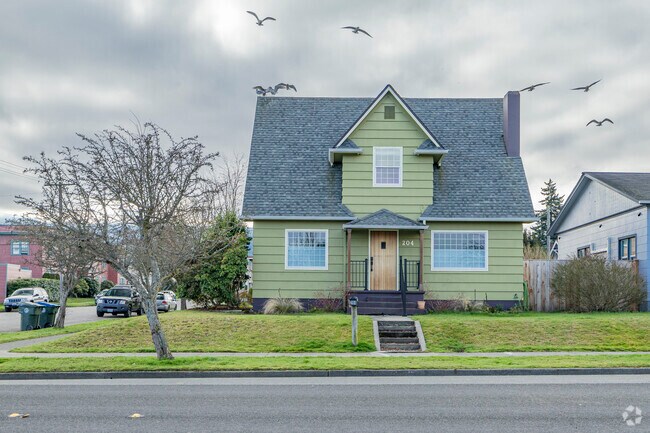 Seagulls swarm above this Port Angeles craftsmen home in Port Angeles WA.