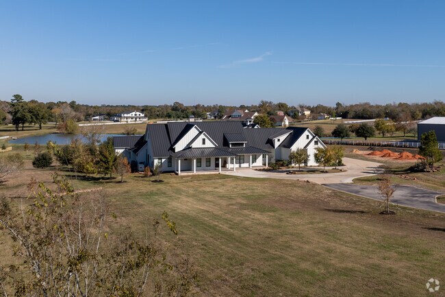 Large custom homes on acreage lots are located in private neighborhoods in Montgomery.