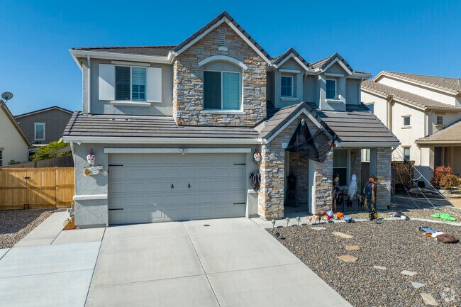Pioneer Meadows has homes with upgraded features like stone accents on the exteriors.