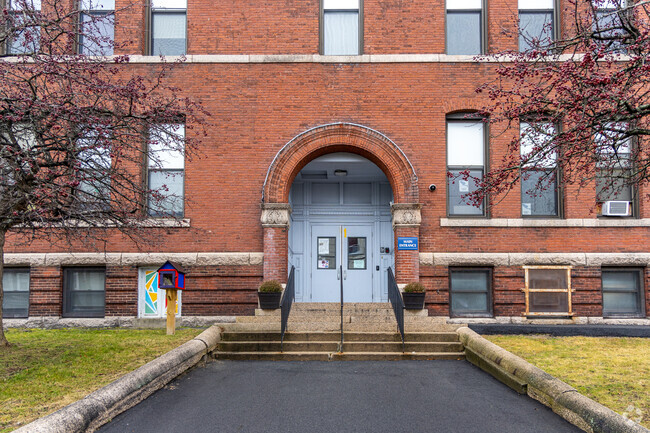 The main entrance to the John K Tarbox Elementary School in Lawrence, MA.