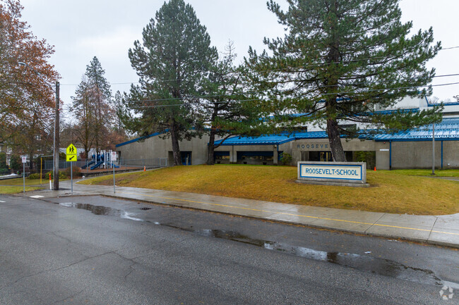 Roosevelt elementary features a small parking lot for visitors.