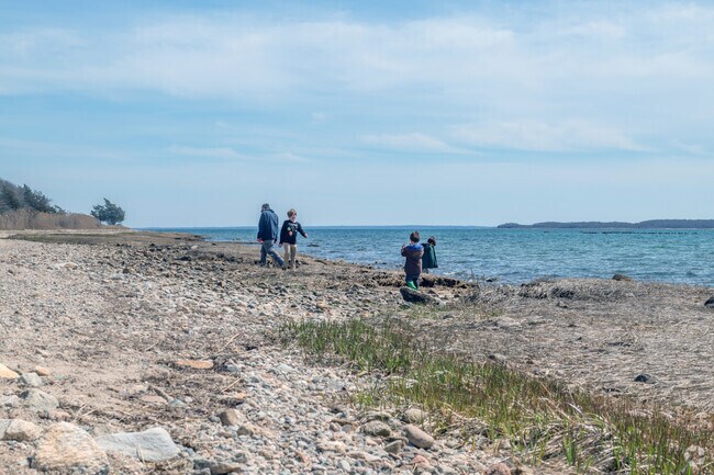 The beach at Nasketucket Bay State Reservation brings families from East Fairhaven for enjoyable times in the fresh air.