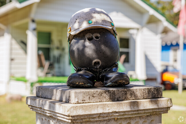 Creative and unique yard ornaments draw the eye throughout Cooper Park.