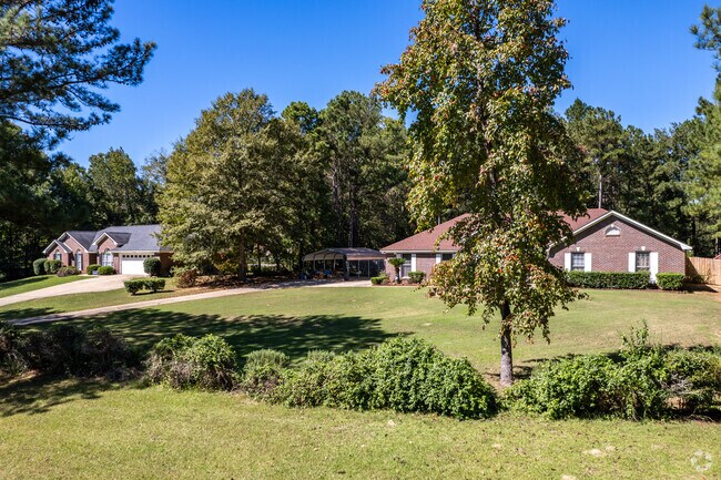 One-story ranch and Craftsman-style homes are common in the Piney Grove area.