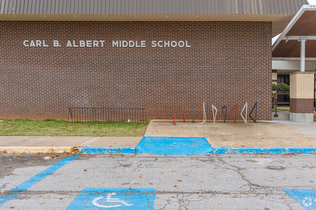 Students at Carl Albert Middle School can safely store their bikes at the front of the school.