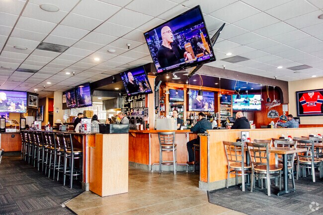 High Five Pizza in the Hayes neighborhood offers a sports bar vibe.