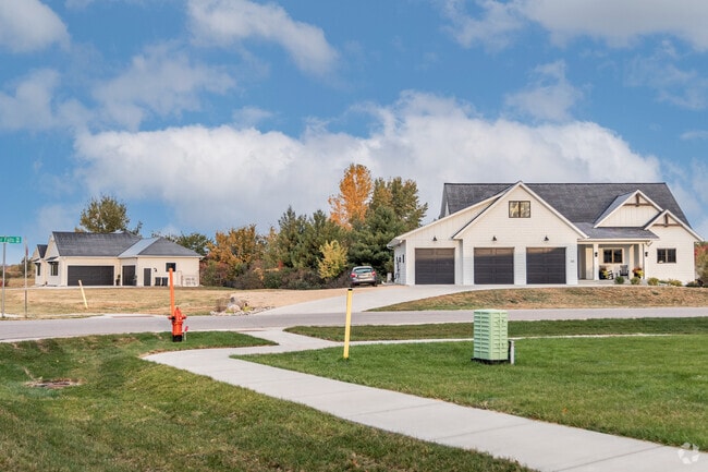 Newly constructed homes with up to three garages populate the Eastwood Park neighborhood.