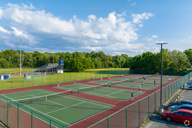 A tennis practice during the summer at Brandywine High School.