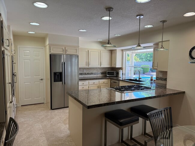 Kitchen with Bar Stools