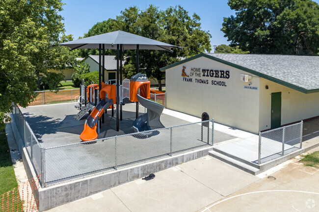 There are multiple playgrounds for students at Thomas Elementary School in Fresno.