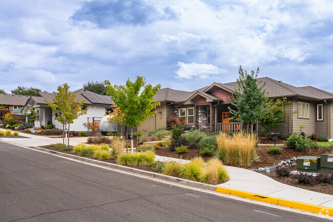 Many of the newly built homes of Mountain Meadows have a large front yard.