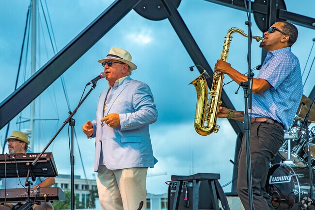 The band at the downtown pier concert is quite entertaining.