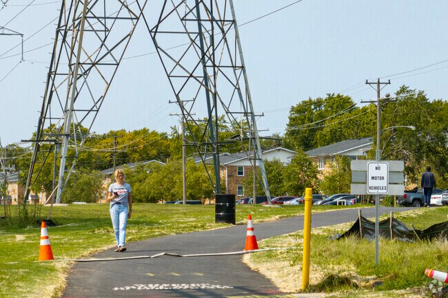 A paved walking paths runs for miles through the center of the Birch Manor neighborhood.