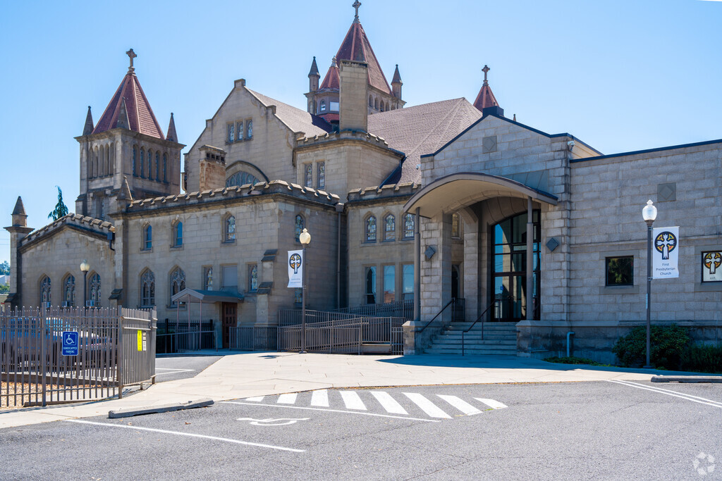 The entrance to First Presbyterian School features a playground.