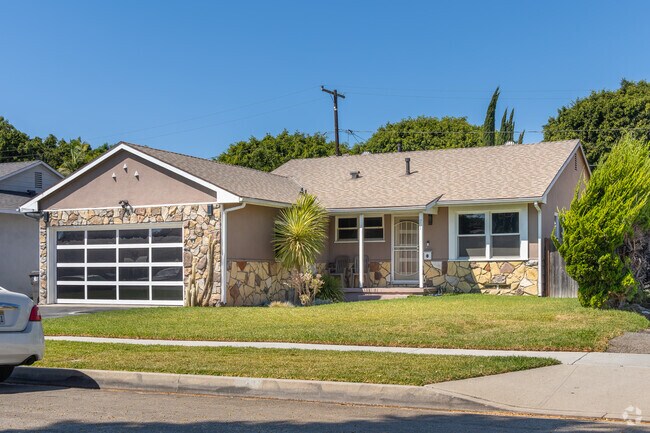 Longwood boasts these beautifully updated midcentury modern homes with custom windows and doors.