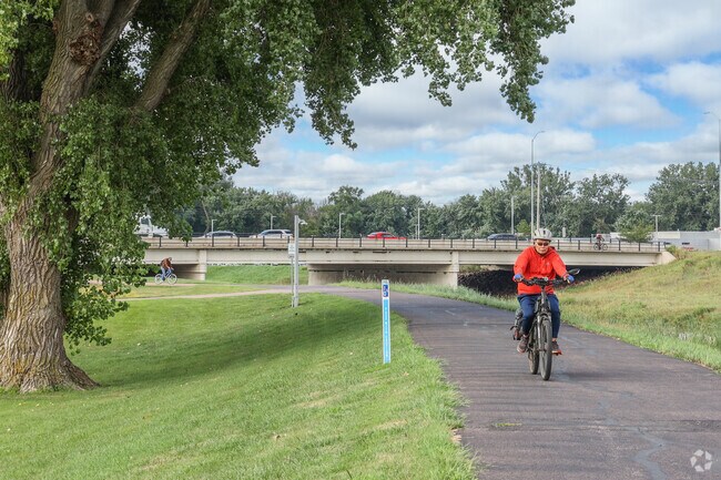 The Sioux Falls Bike Trails winds for miles along the Big Sioux River, cutting through Garfield.
