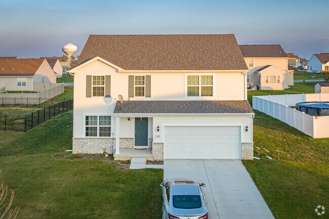 Homes in Lowell's Cedar Creek neighborhood show a variety of architectural styles.