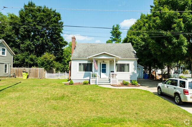 Contemporary Craftsman homes in Hartland are nestled among mature trees for a serene setting.