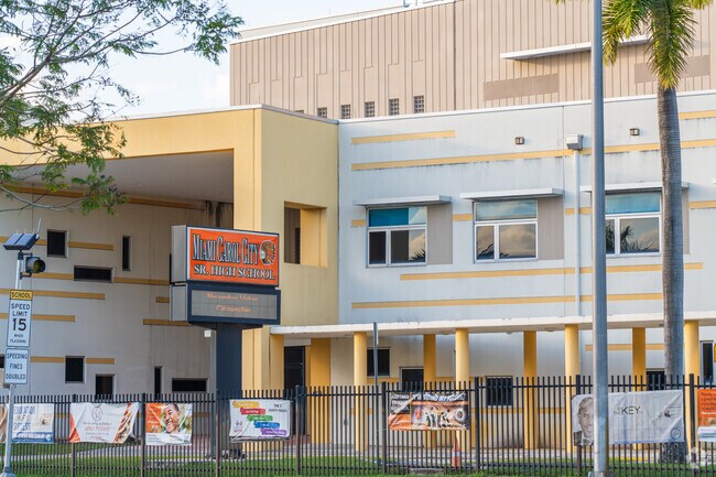 Education thrives in the secure embrace of Miami Carol City Senior High School.
