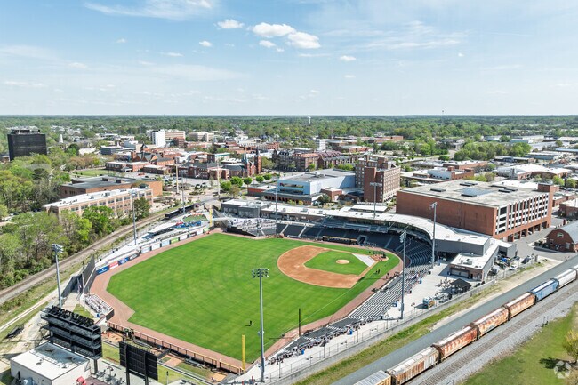 Residents of Douglas Byrd can enjoy a baseball game at Segra Stadium, home to the Woodpeckers, offering a fun and exciting sports experience.