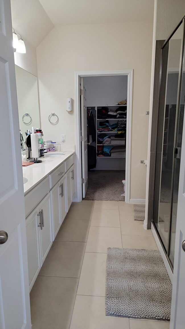 Master bath with huge walk in closet