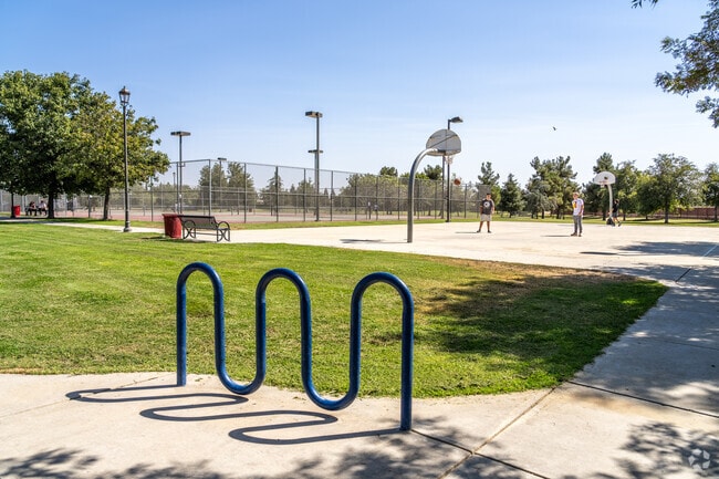 Challenge your friends to a game of basketball at Madison Grove Park.