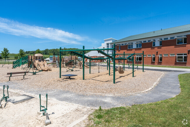 The Great Falls Elementary School features a playground with equipment for a variety of ages.