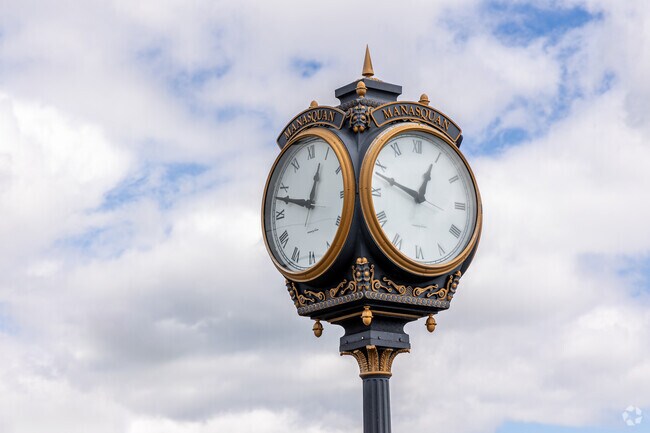 The town's iconic clock is situated right at the entrance of the Manasquan train station.