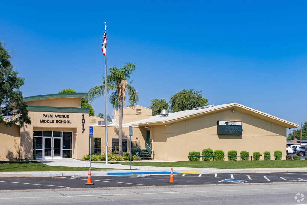 An American flag waves at the entrance to Palm Avenue Middle School in Wasco.