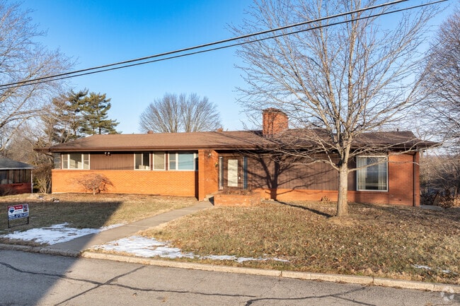 Sleek lines and timeless charm define this midcentury modern gem in Jefferson City.
