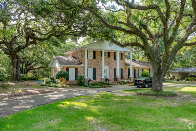 Many Airmont homes feature detailed landscaping and roomy lawns.
