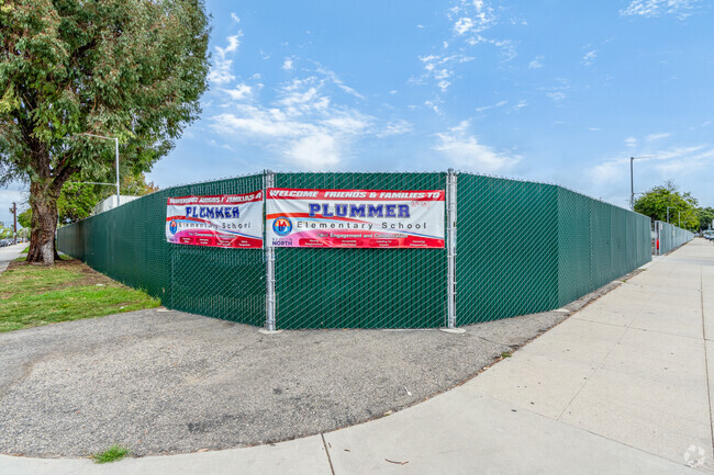 Plummer Elementary School has signage posted around the gate with contact info in North Hills.