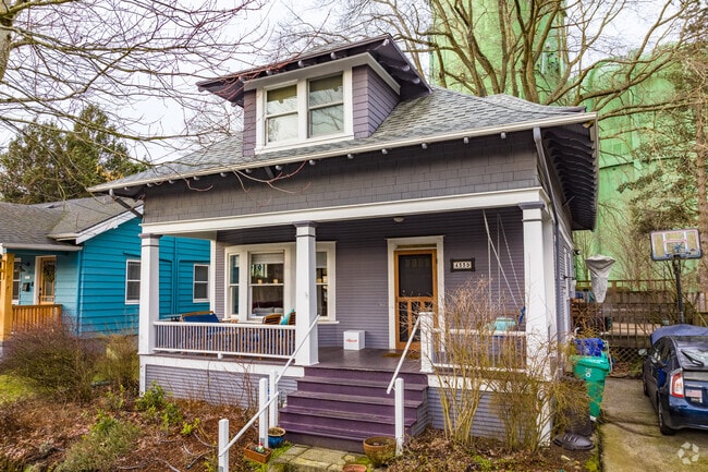Colorful craftsman-style homes feature a spacious patio for Sabin residents to relax on.