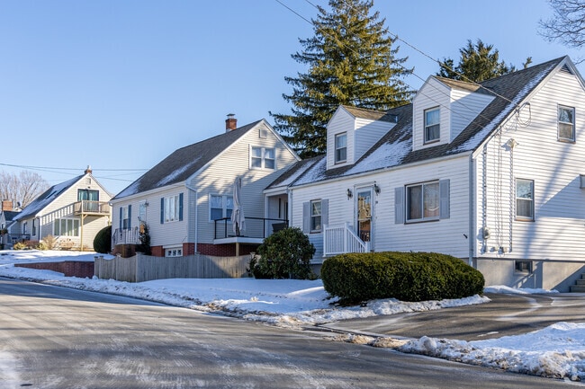 A row of homes on a snowy winter day in the Riverview neighborhood of Gloucester, MA.