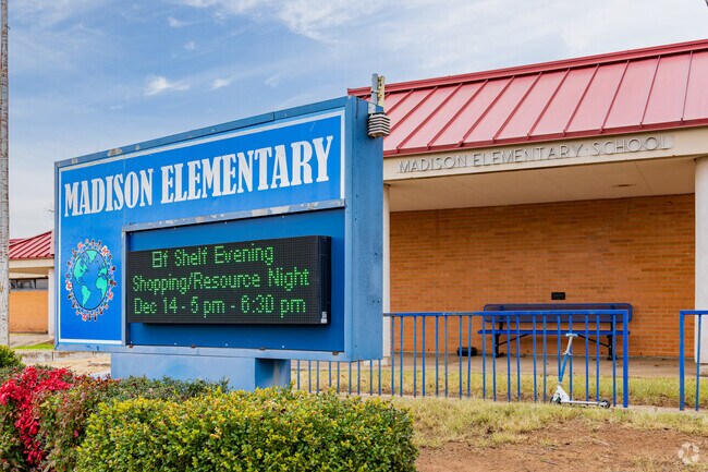 Close up shot of the signage of Madison Elementary School.