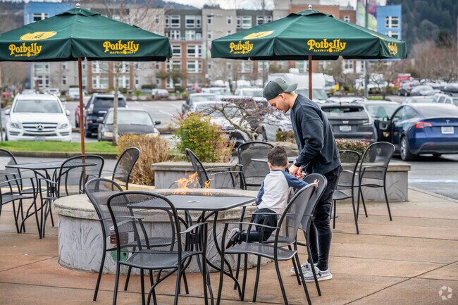 At Issaquah Commons near Tibbetts Creek Valley, residents enjoy an open-air shopping center.