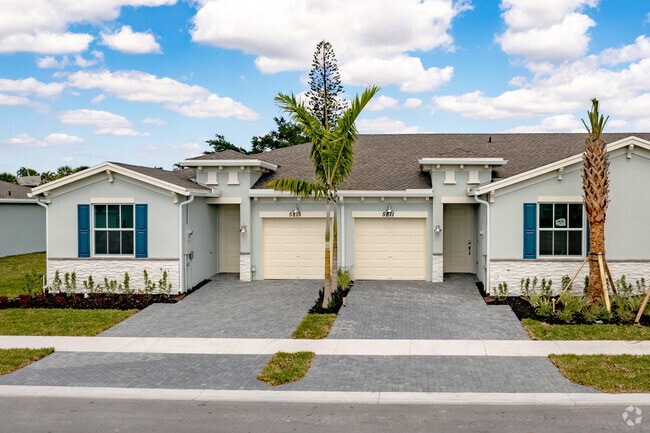 Over 55 new construction homes are becoming common in the Palm Greens neighborhood.
