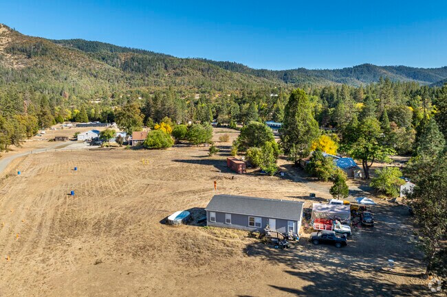 Manufactured homes sit on large land that can be used for various farming in Williams.