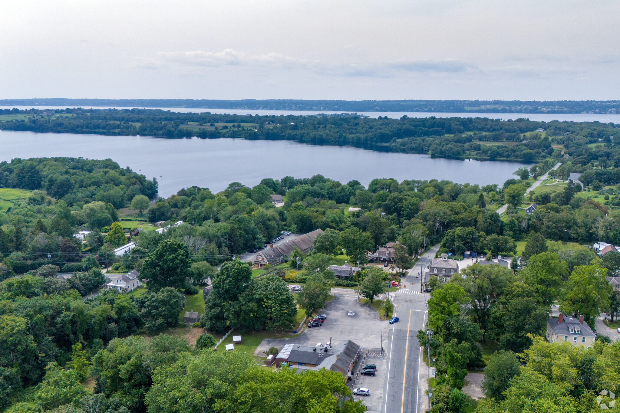 This aerial view of the Four Corners neighborhood of Tiverton shows Nonquit Pond in the back.