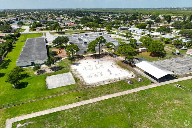 Robert L. Stevenson Elementary School provides a playground and ball courts.
