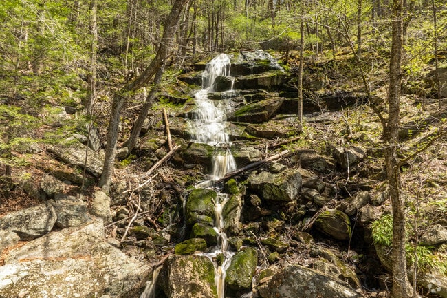 Spirit Falls is a secluded waterfall located  within Jacobs Hill Reservation in Royalston.