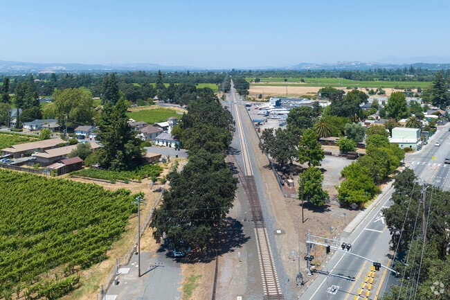 In Fulton, California the Bart runs through town with vineyards lining its tracks.