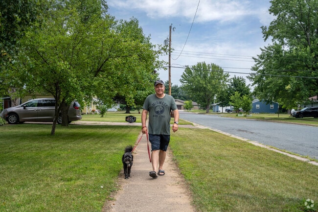 Altoona residents enjoy taking a stroll along the sidewalk lined streets.